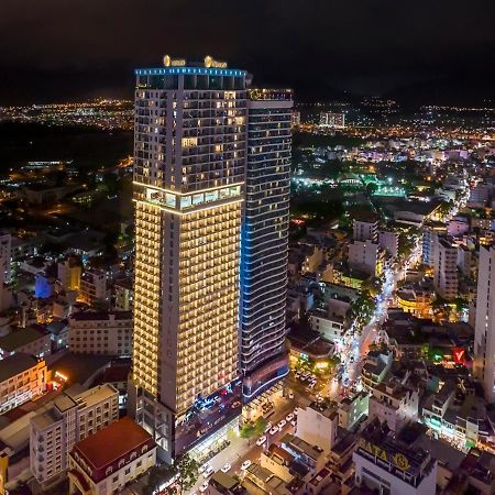 Virgo Hotel Nha Trang Exterior foto Aerial view of the hotel at night