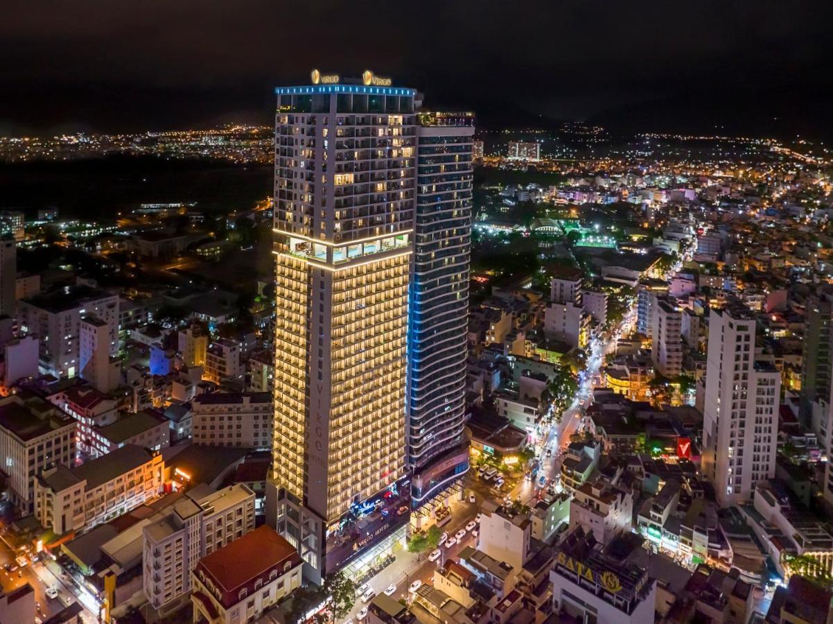 Virgo Hotel Nha Trang Exterior foto Aerial view of the hotel at night