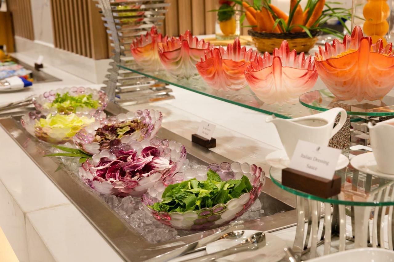 Virgo Hotel Nha Trang Exterior foto A salad bar