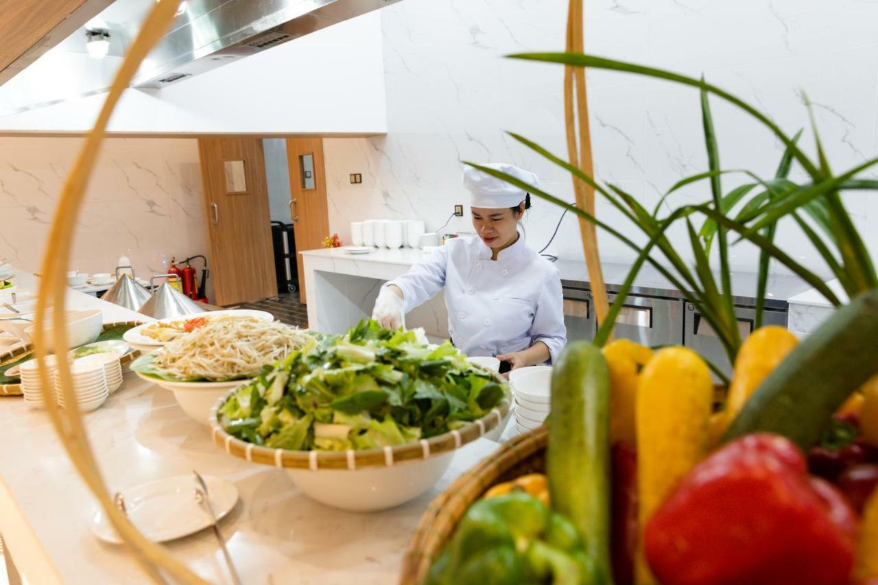 Virgo Hotel Nha Trang Exterior foto A chef working in a hotel kitchen